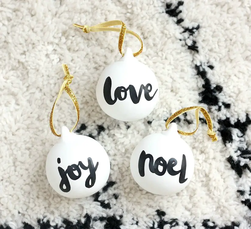 hand lettered ceramic baubles christmas