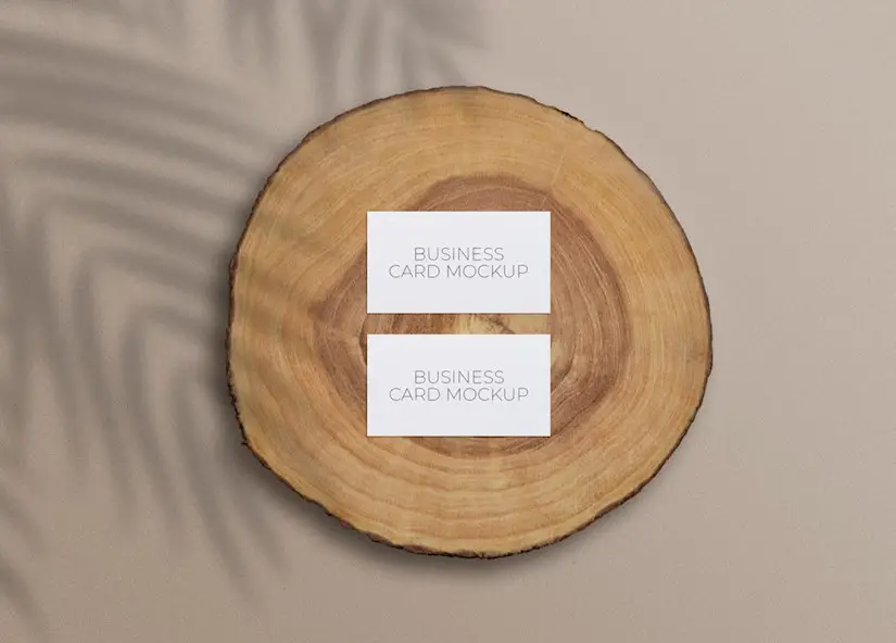 business cards on a wood slice mockup