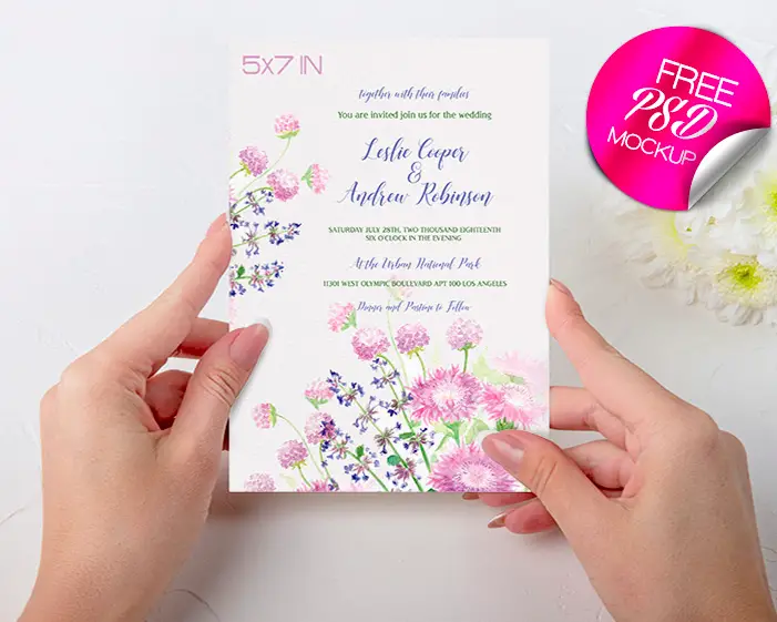 free wedding invitation held in hands mock up in psd