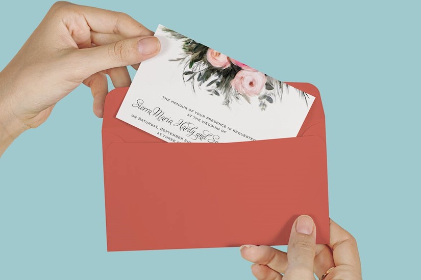 hand envelope invitation mock up