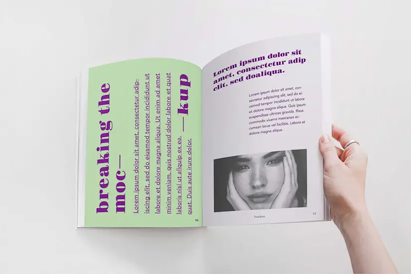 free opened by hand magazine mockup psd