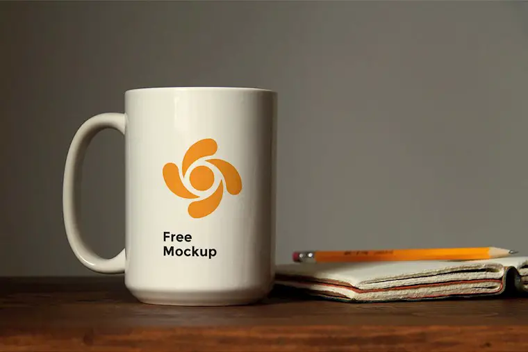 free mug on table mockup psd