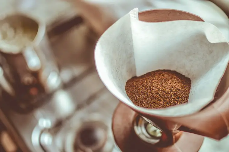 brown coffee on strainer background