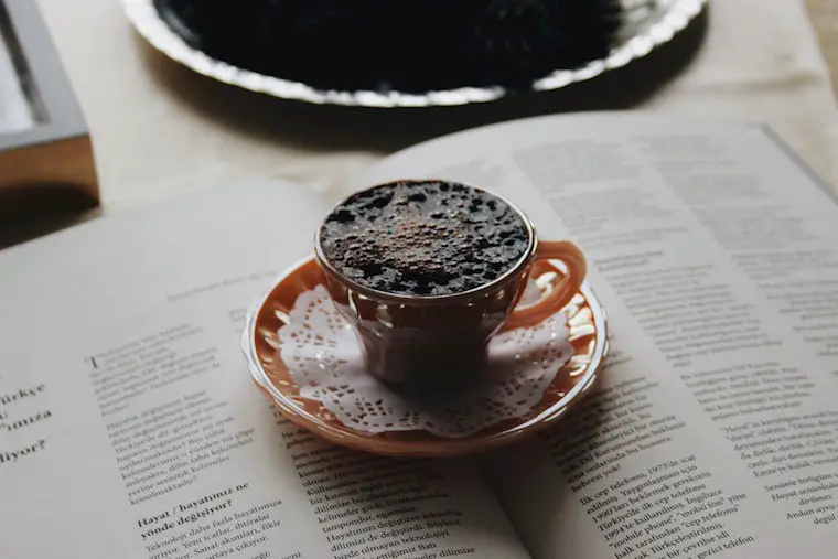 coffee on a book page background
