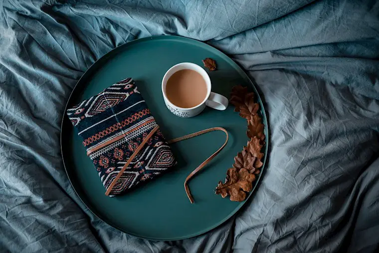 cup of coffe and notebook background