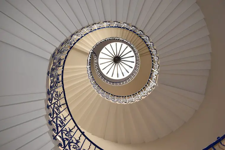 white spiral stairway wallpaper
